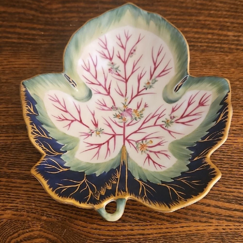 3 For $10 Leaf-Shaped Decorative Plate with Blue and Green Accents.